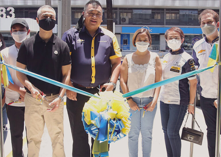 Chevy Makati cutting ribbon